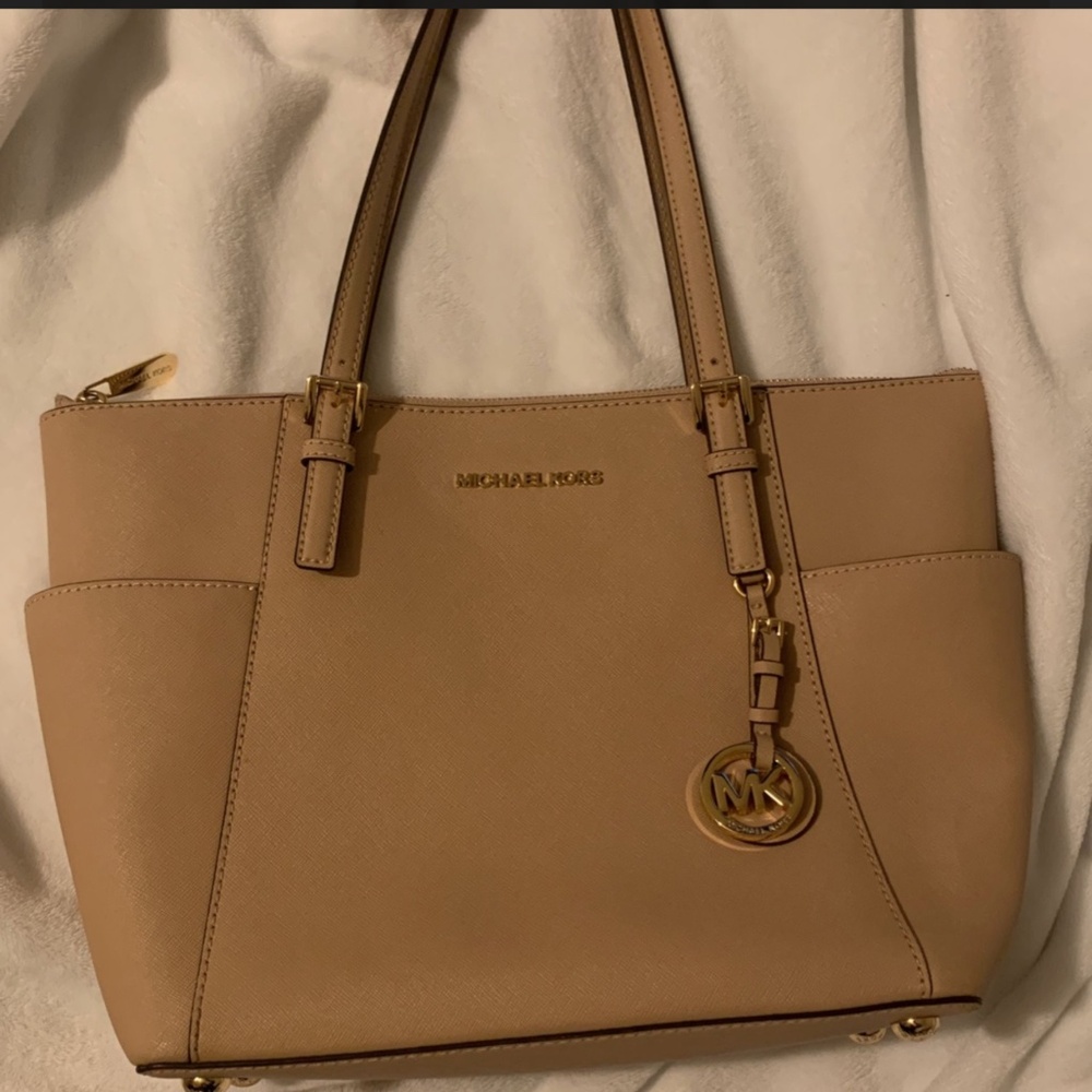 Beige Michael Kors purse and wallet